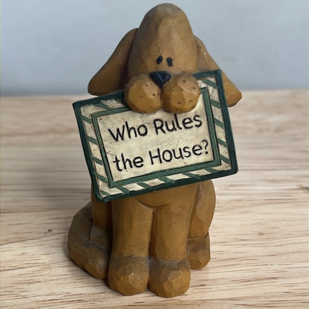 Blossom Bucket DOG HOLDING A WHO RULES THE HOUSE SIGN by Pat Olson